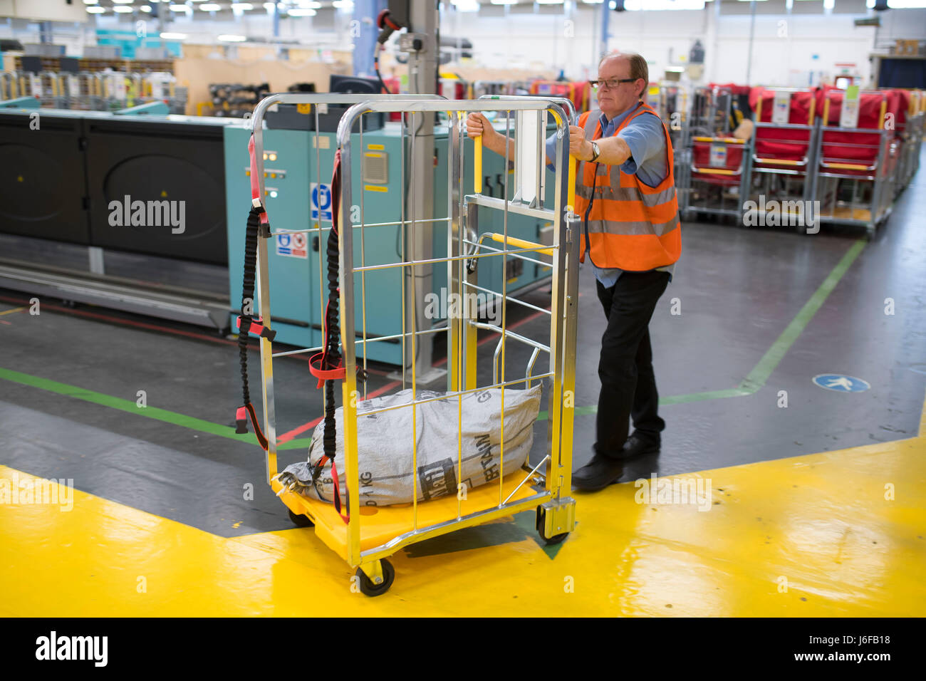 Royal Mail mail workers at working at a sorting office in Cardiff