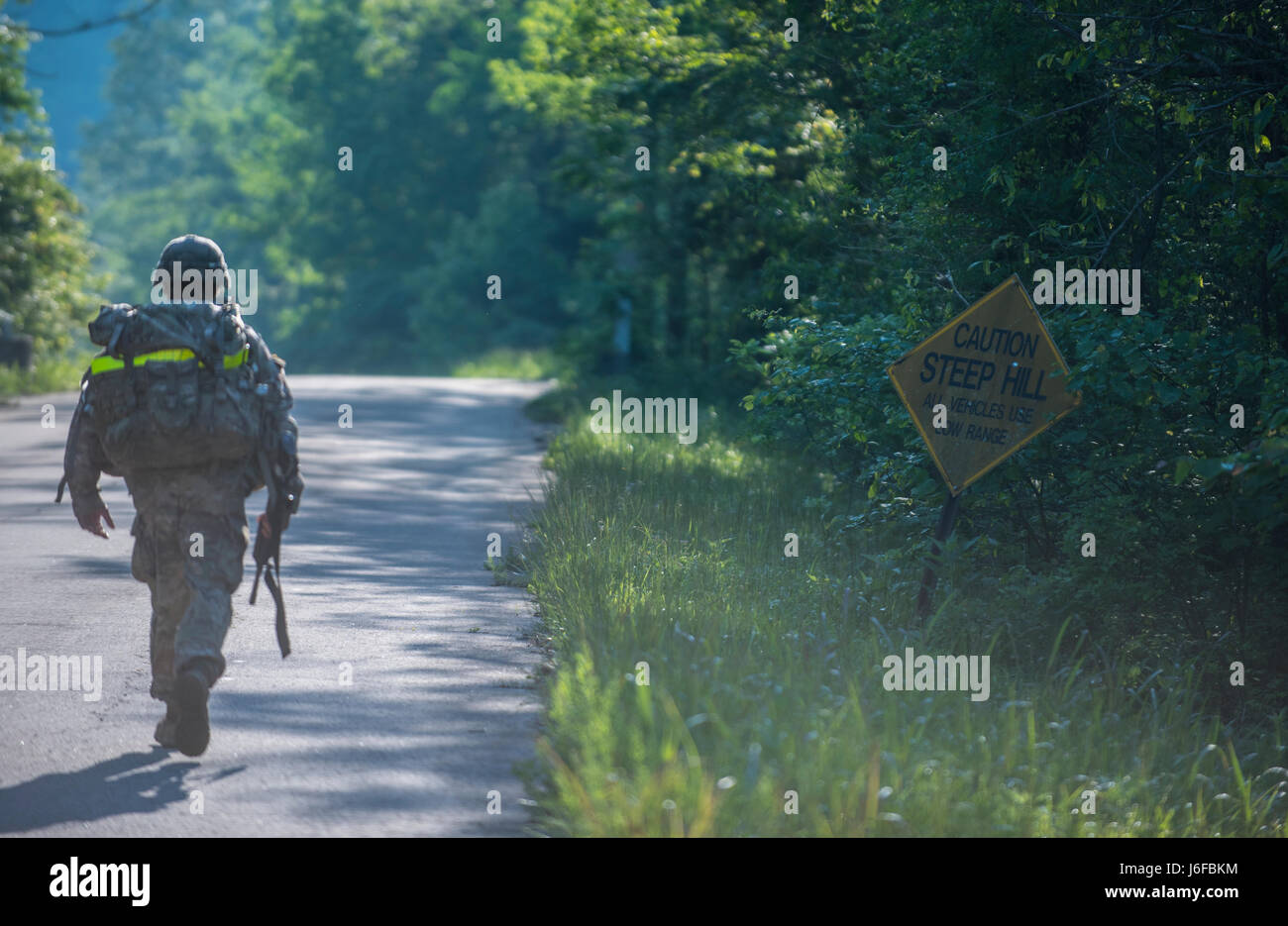 Soldiers participate in a 6-mile ruck march as part of the U.S. Army ...