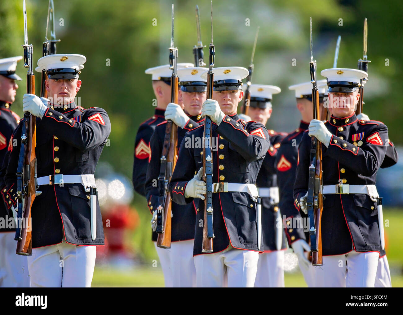 The U.S. Marine Corps Silent Drill Platoon performs during the Centennial Celebration Ceremony at Lejeune Field, Marine Corps Base (MCB) Quantico, Va., May 10, 2017. The event commemorates the founding of MCB Quantico in 1917, and consisted of performances by the U.S. Marine Corps Silent Drill Platoon and the U.S. Marine Drum & Bugle Corps. (U.S. Marine Corps photo by James H. Frank) Stock Photo