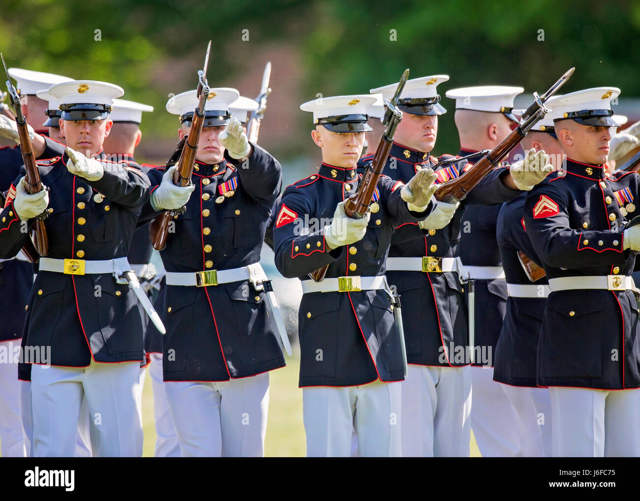 The U.S. Marine Corps Silent Drill Platoon performs during the Centennial Celebration Ceremony at Lejeune Field, Marine Corps Base (MCB) Quantico, Va., May 10, 2017. The event commemorates the founding of MCB Quantico in 1917, and consisted of performances by the U.S. Marine Corps Silent Drill Platoon and the U.S. Marine Drum & Bugle Corps. (U.S. Marine Corps photo by James H. Frank) Stock Photo