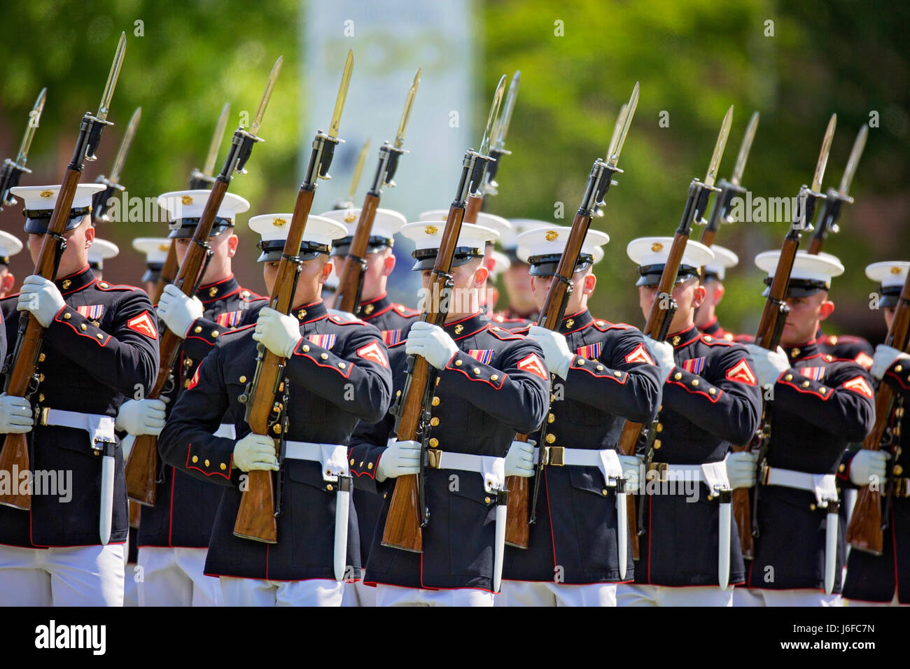 The U.S. Marine Corps Silent Drill Platoon performs during the Centennial Celebration Ceremony at Lejeune Field, Marine Corps Base (MCB) Quantico, Va., May 10, 2017. The event commemorates the founding of MCB Quantico in 1917, and consisted of performances by the U.S. Marine Corps Silent Drill Platoon and the U.S. Marine Drum & Bugle Corps. (U.S. Marine Corps photo by James H. Frank) Stock Photo