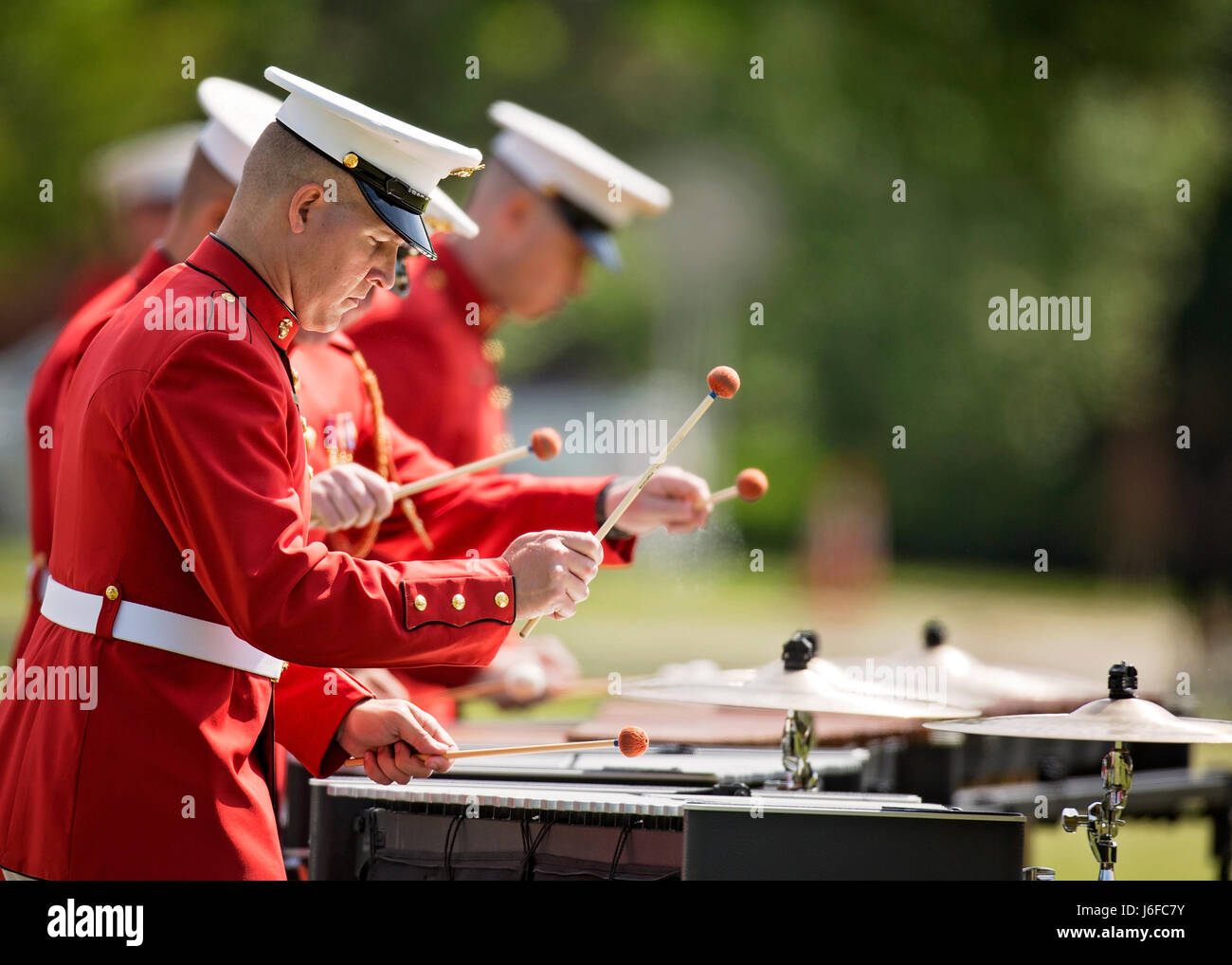 Members of the U.S. Marine Drum & Bugle Corps perform during the Centennial Celebration Ceremony at Lejeune Field, Marine Corps Base (MCB) Quantico, Va., May 10, 2017. The event commemorates the founding of MCB Quantico in 1917, and consisted of performances by the U.S. Marine Corps Silent Drill Platoon and the U.S. Marine Drum & Bugle Corps. (U.S. Marine Corps photo by James H. Frank) Stock Photo