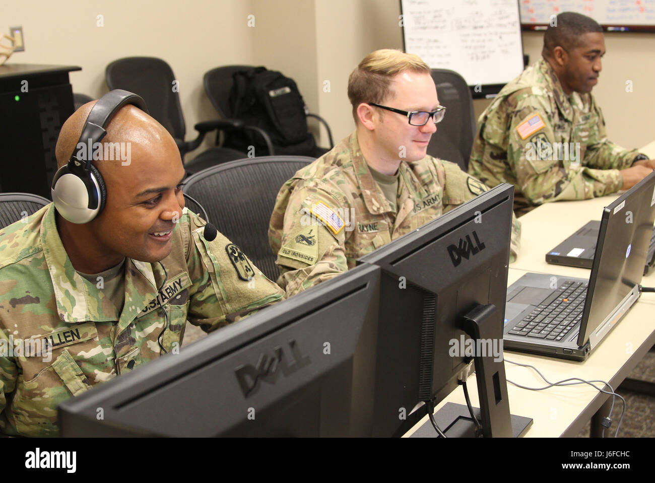 Spc. Tracy William, Sgt.Colton Cragne, and Spc. Thomas Allen with the South Carolina Army National Guard coordinates with the Notional Air Defense Artillery Brigade located in Jordan, at Joint Force Command, Suffolk, Va. Eager Lion is an annual U.S. Central Command exercise in Jordan designed to strengthen military-to-military relationships between the U.S., Jordan and other international partners. This year's iteration is comprised of about 7,200 military personnel from more than 20 nations that will respond to scenarios involving border security, command and control, cyber defense and battle Stock Photo