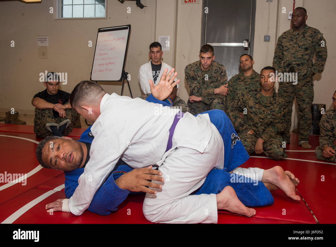 U.S. Marines receive instruction on basic Brazilian Jujitsu moves ...