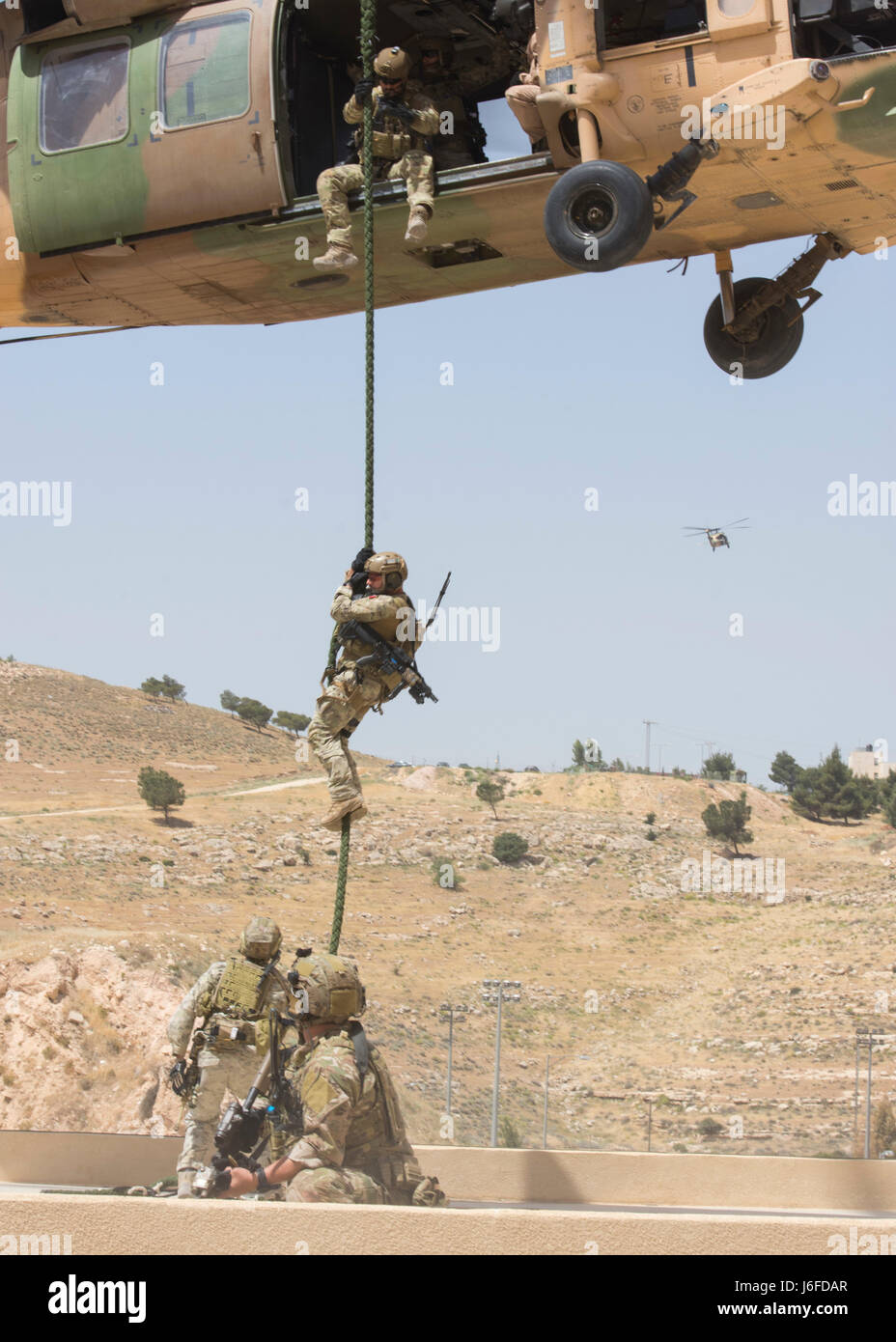 Uh 60 Fast Roping Vector Air Force Special Operations personnel from the 23rd Special Tactics ...