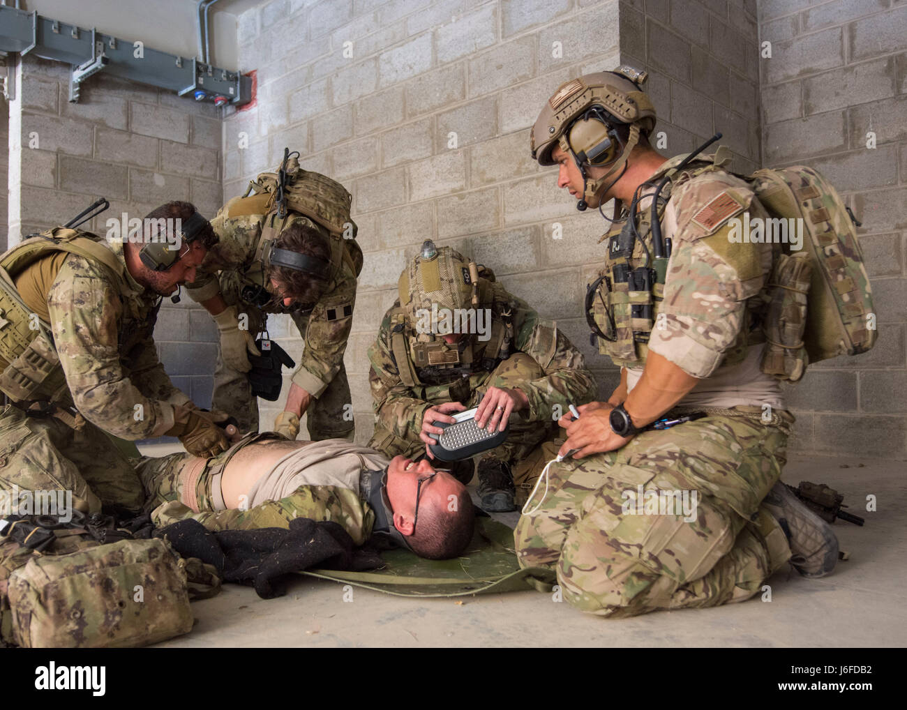 AMMAN, Jordan (May 11, 2017) Members of the Air Force and Italian Special Operations provide medical care during a combat search and rescue exercise in support of Eager Lion 2017. Eager Lion is an annual U.S. Central Command exercise in Jordan designed to strengthen military-to-military relationships between the U.S., Jordan and other international partners. This year's iteration is comprised of about 7,200 military personnel from more than 20 nations that will respond to scenarios involving border security, command and control, cyber defense and battlespace management. (U.S. Navy photo by Mas Stock Photo