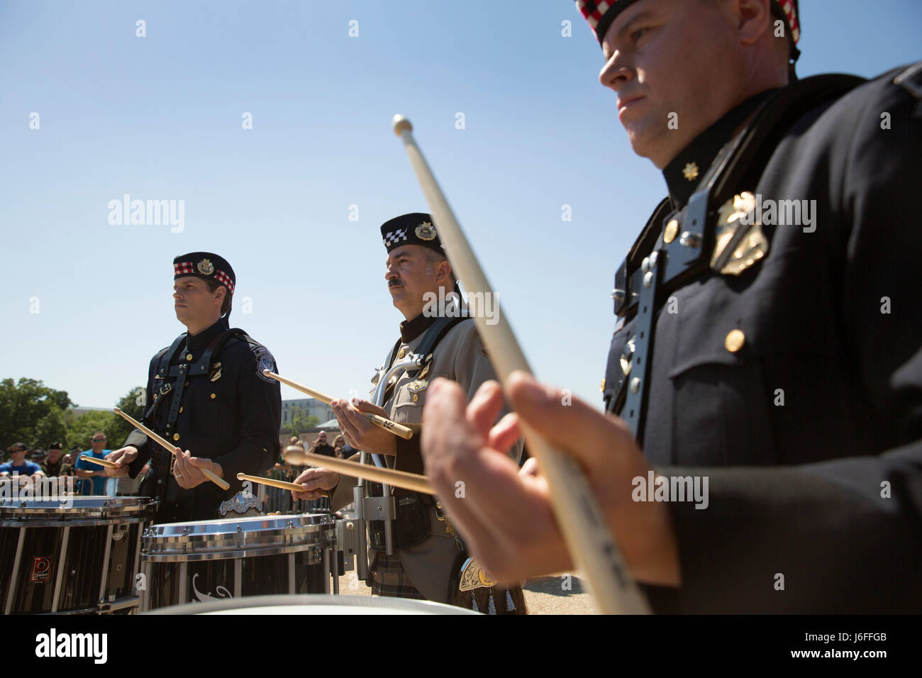 The U.S. Customs and Border Protection Pipes and Drums perform in the