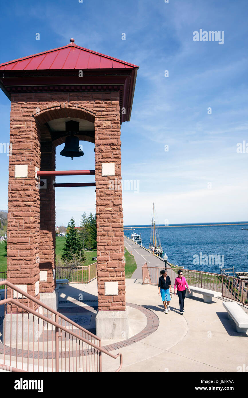 Marquette Michigan Upper Peninsula UP Lake Superior,Elwood Mattson Lower Harbor Park,early spring,Great Lakes,waterfront,walkway,walking,woman female Stock Photo