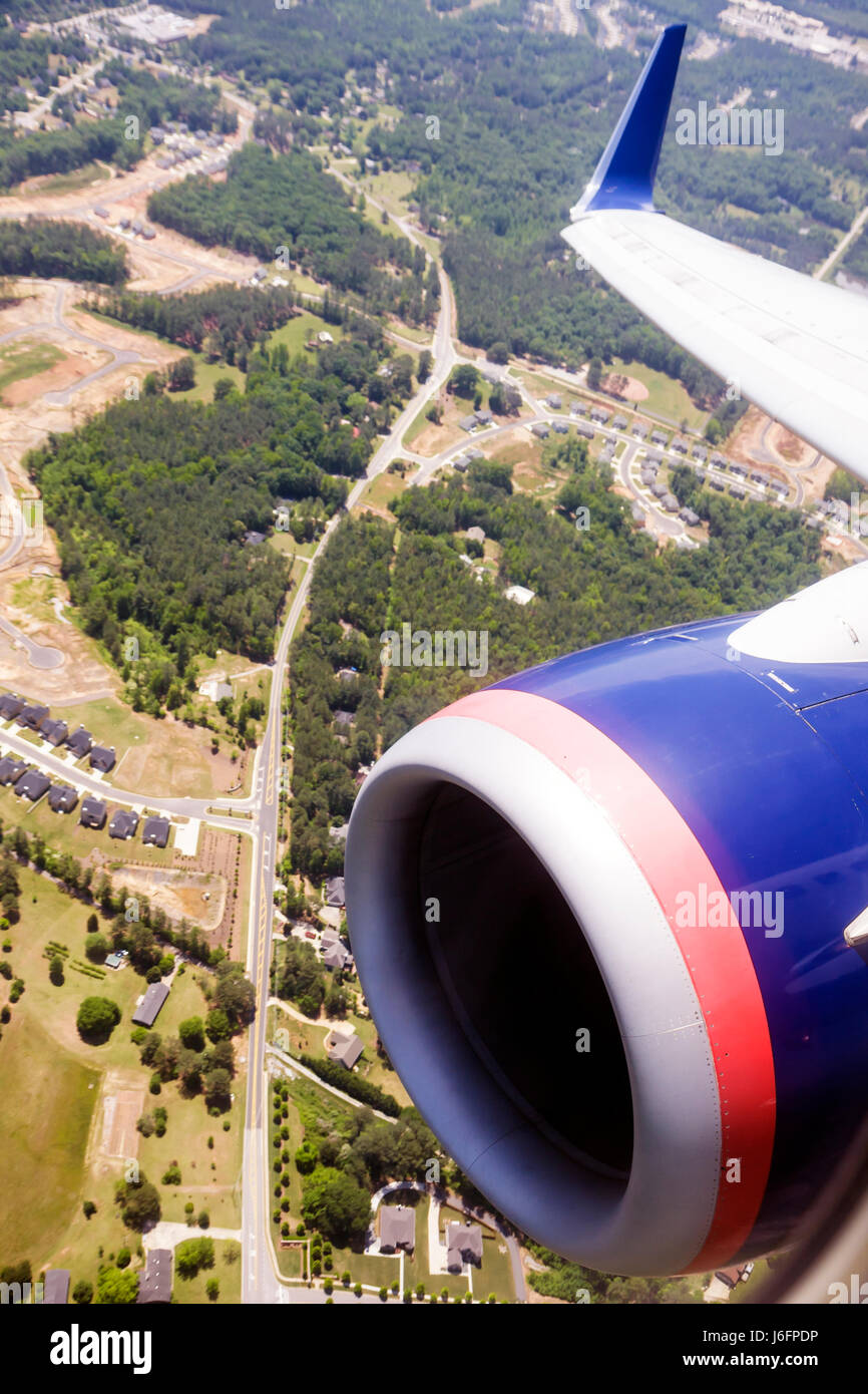 Atlanta Georgia,Hartsfield Jackson Atlanta International Airport,Delta Airlines,Air Lines,jet engine,wing,aerial overhead view from above,ground,throu Stock Photo