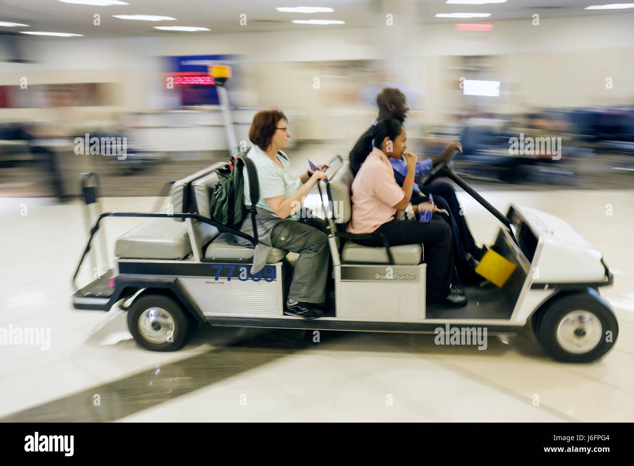 Electric cart transport airport hires stock photography and images Alamy