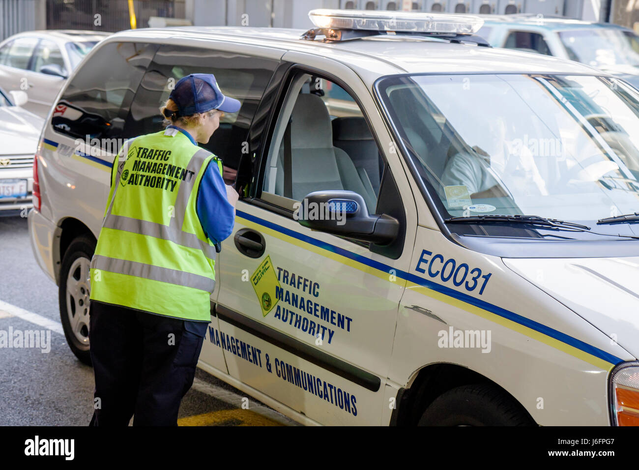 Chicago Illinois,ORD,O'Hare International Airport,Traffic Management Authority,woman female women,van,public safety,woman female women,employee worker Stock Photo
