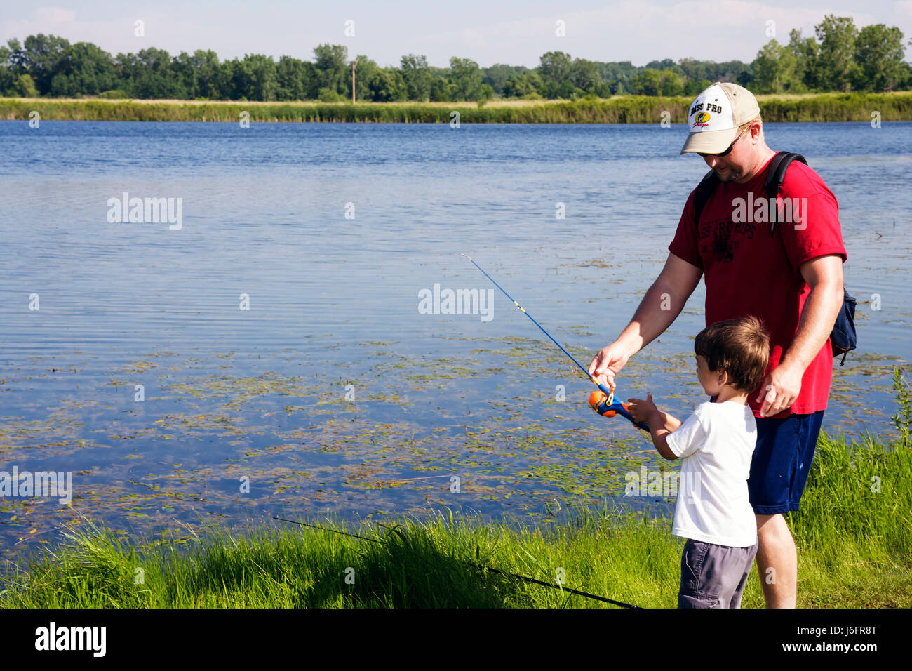 Wisconsin Kenosha County,Kenosha,Kansasville,Richard Bong State Recreation Area,Wolf Lake,fishing,father,parent parents,son,man men male,boy boys,kid Stock Photo