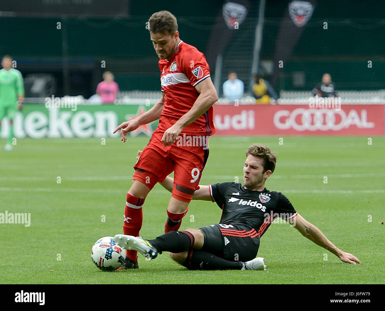 Washington, DC, USA. 20th May, 2017. 20170520 - D.C. United forward PATRICK MULLINS (16) makes a defensive play against Chicago Fire forward LUIS SOLIGNAC (9) in the first half at RFK Stadium in Washington. Credit: Chuck Myers/ZUMA Wire/Alamy Live News Stock Photo