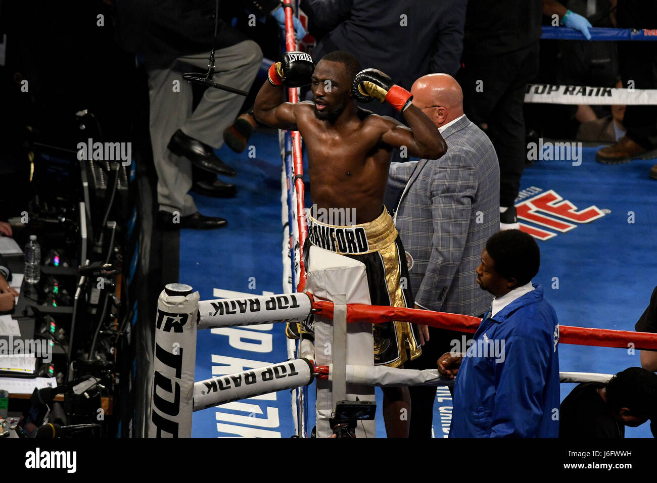 New York, New York, USA. 20th May, 2017. TERRENCE CRAWFORD (black and gold trunks) celebrates after defeating FELIX DIAZ in a WBO World Championship bout at Madison Square Garden in New York. Credit: Joel Plummer/ZUMA Wire/Alamy Live News Stock Photo