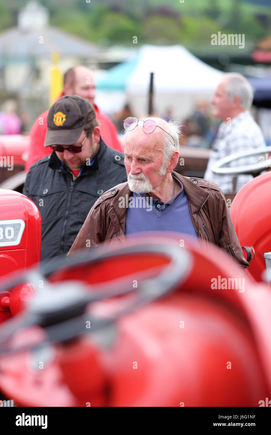 Royal Welsh Spring Festival, Builth Wells, Powys, Wales - May 2017 - Visitors browse amongst the vintage tractor exhibits at the Royal Welsh Spring Festival held in Mid Wales. Photo Steven May / Alamy Live News Stock Photo