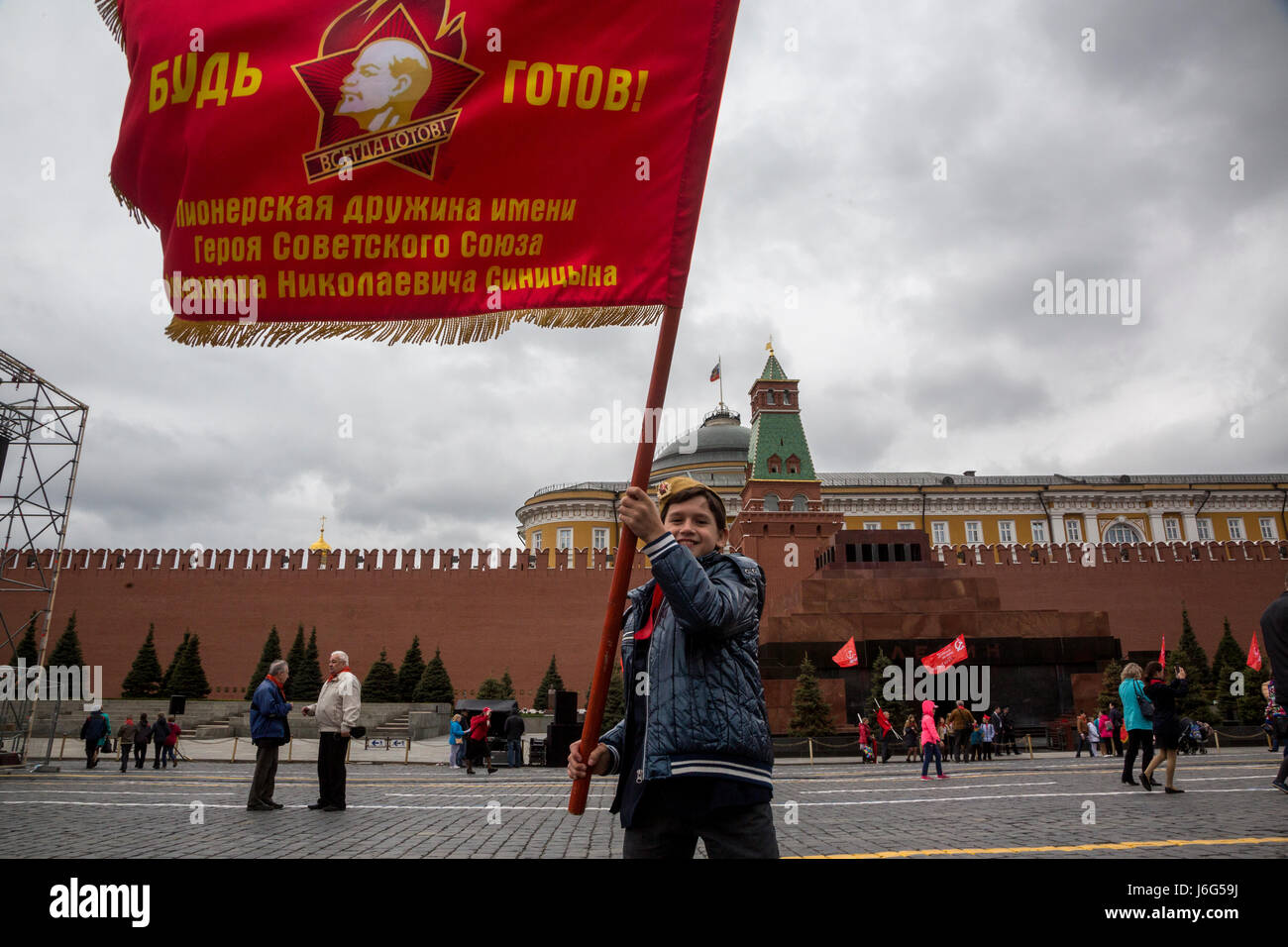 Moscow, Russia. 21st May, 2017. Children attend the official ceremony of tying red scarves around their necks, symbolizing their initiation into the Young Pioneer Youth communist group, created in the Soviet Union for children 10-14 years old, in Moscow's Red square on May 21, 2017. Some three thousands pioneers took part in the ceremony. Credit: Nikolay Vinokurov/Alamy Live News Credit: Nikolay Vinokurov/Alamy Live News Stock Photo