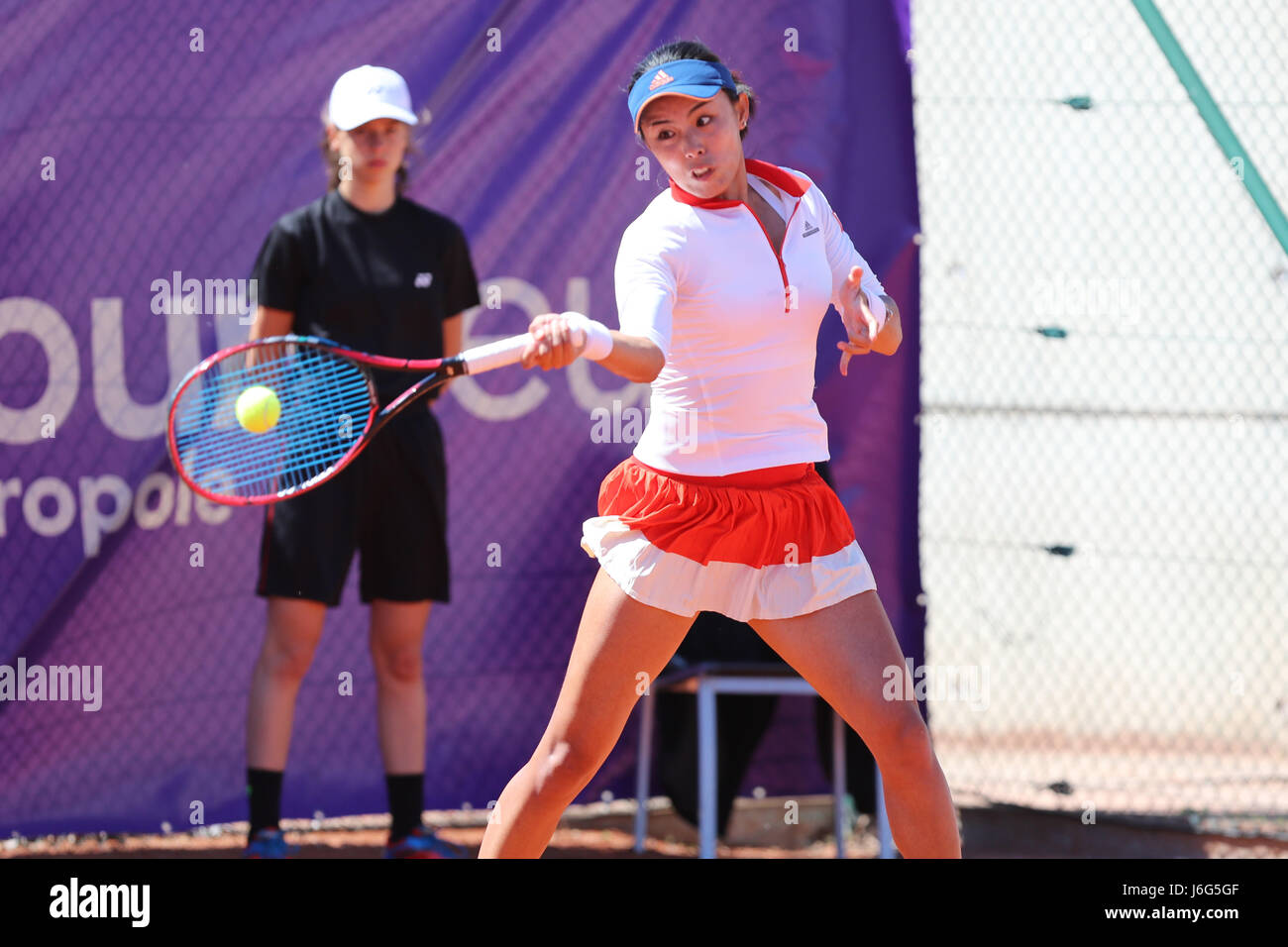 Strasbourg, France. 21st May, 2017. Chinese player Qiang Wang is in action during her match in the 1st round of the WTA tennis Internationaux of Strasbourg vs Japanese player Risa Ozaki on May 21, 2017 in Strasbourg, France - ©Yan Lerval/Alamy Live News Stock Photo