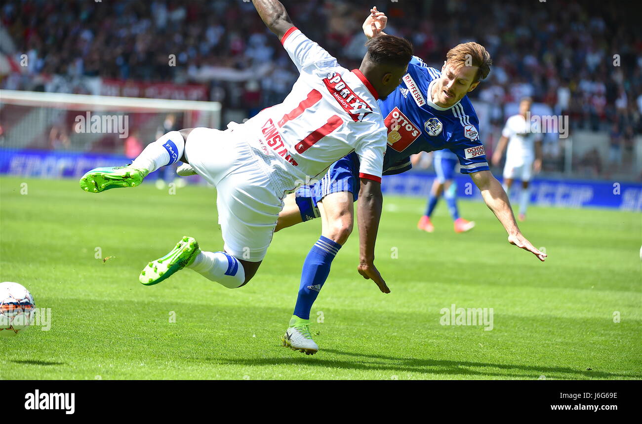 Sion, Switzerland. 21st May, 2017. Sion, 21.05.2017, Football Raiffeisen Super League, FC Sion - FC Lucerne, Kevin Constant (FC Sion 11) duel with François Affoler (FCL 16) Photo: Cronos/Frederic Dubuis Stock Photo