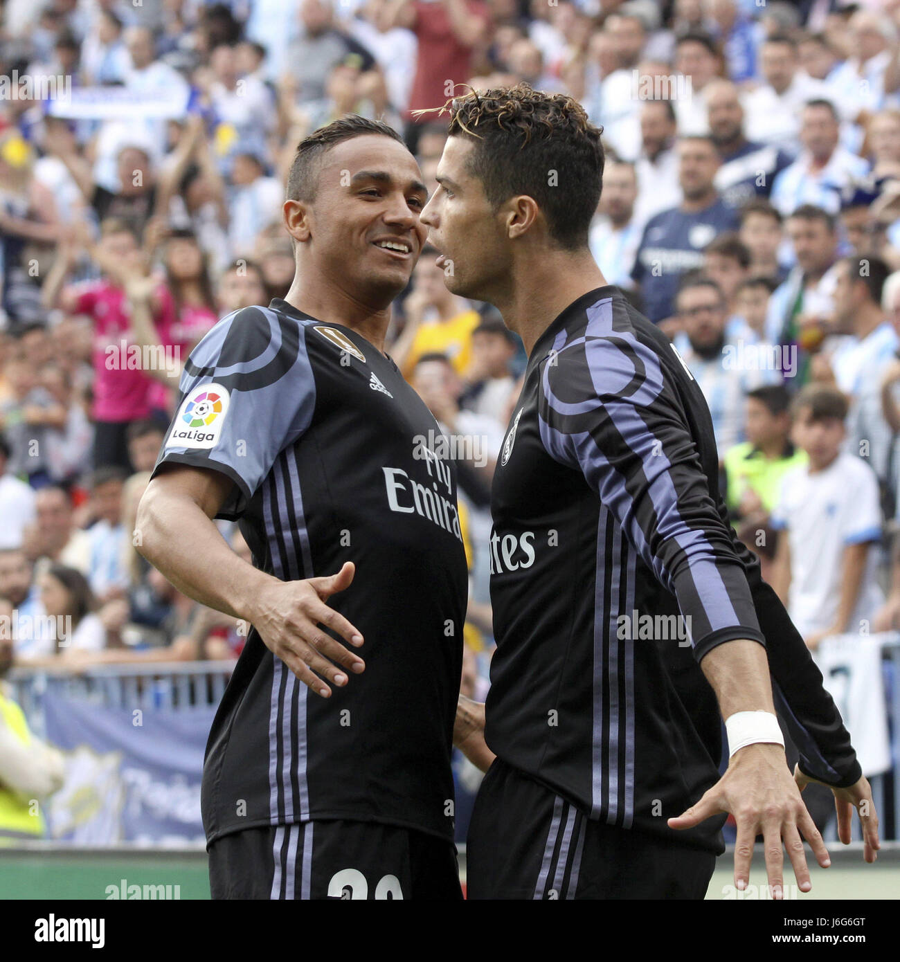 Malaga Spain 21st May 17 Real Madrid S Striker Cristiano Ronaldo R Celebrates With Real Madrid S Player Danilo L After Scoring The First Goal Of The Team Against Malaga Cf During The Liga Malaga Spain 21st May 17 Real Madrid S Striker Cristiano Ronaldo R Celebrates With Real Madrid S Player Danilo L After Scoring The First Goal Of The Team Against Malaga Cf During The Liga