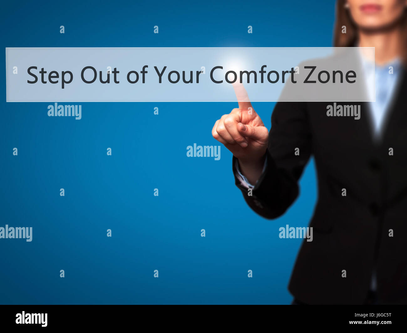 Step Out of Your Comfort Zone - Businesswoman hand pressing button on touch screen interface. Business, technology, internet concept. Stock Photo Stock Photo