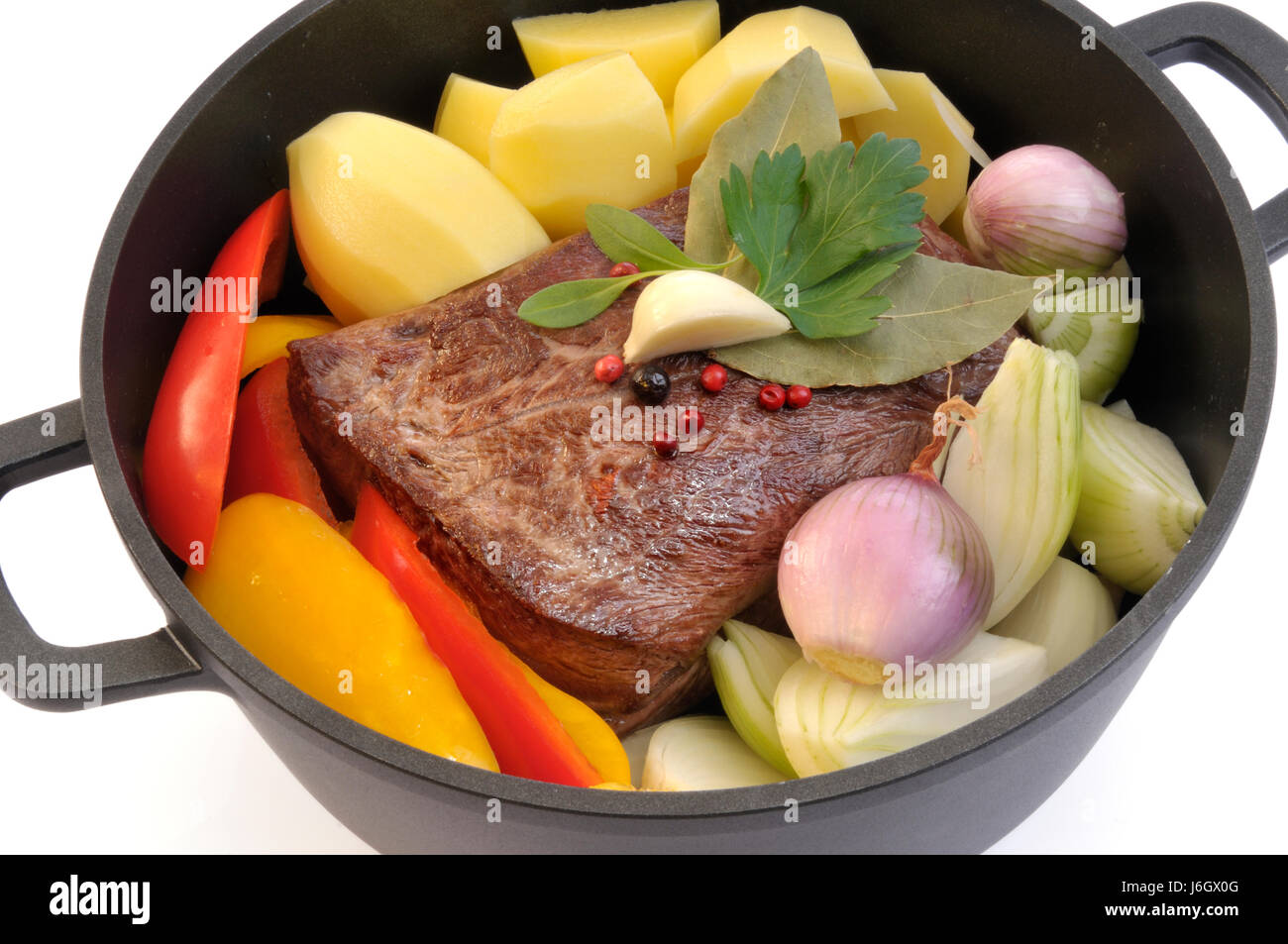 boil cooks boiling cooking vegetable bovine onion paprika peppers braised meat Stock Photo