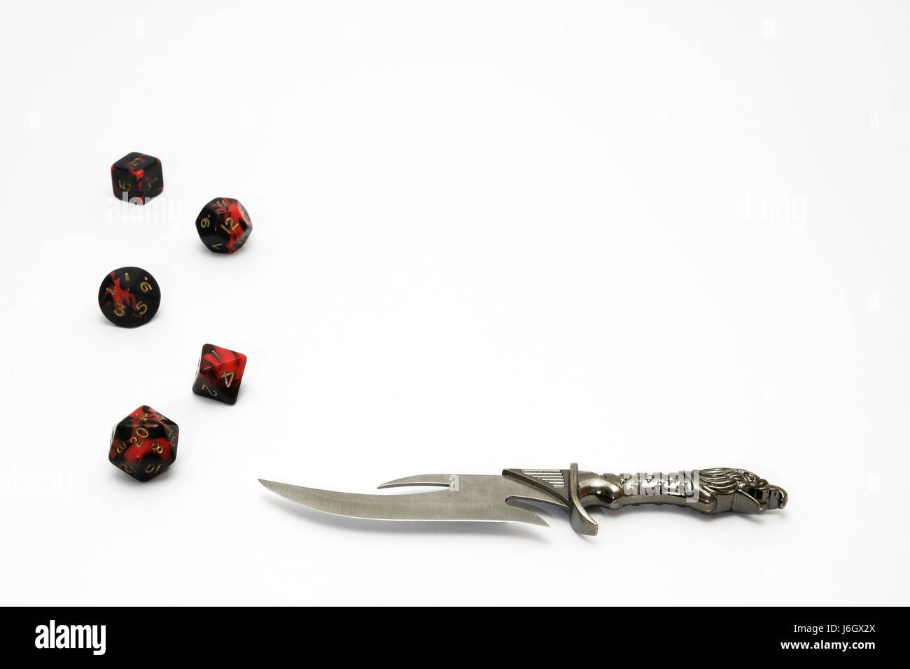 rpg dice and knife Stock Photo Alamy