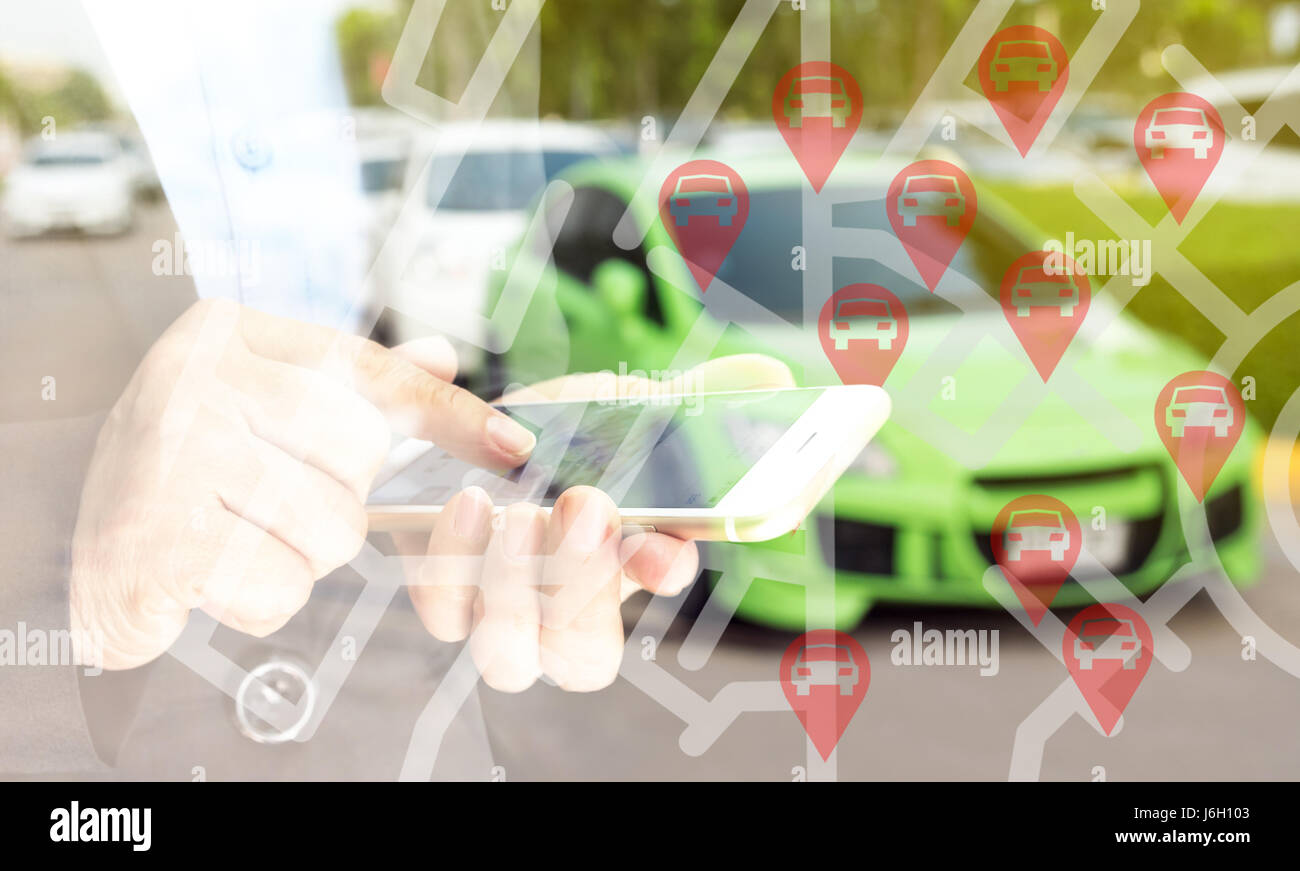 Car sharing service or rental concept. Sharing economy and collaborative consumption. Double exposure of business man holding mobile phone and use app Stock Photo