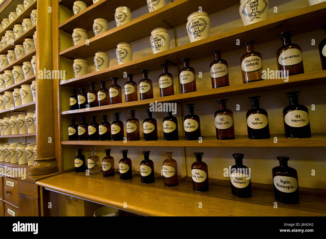 shelf bottles means agent medicine drug remedy substance pharmacy