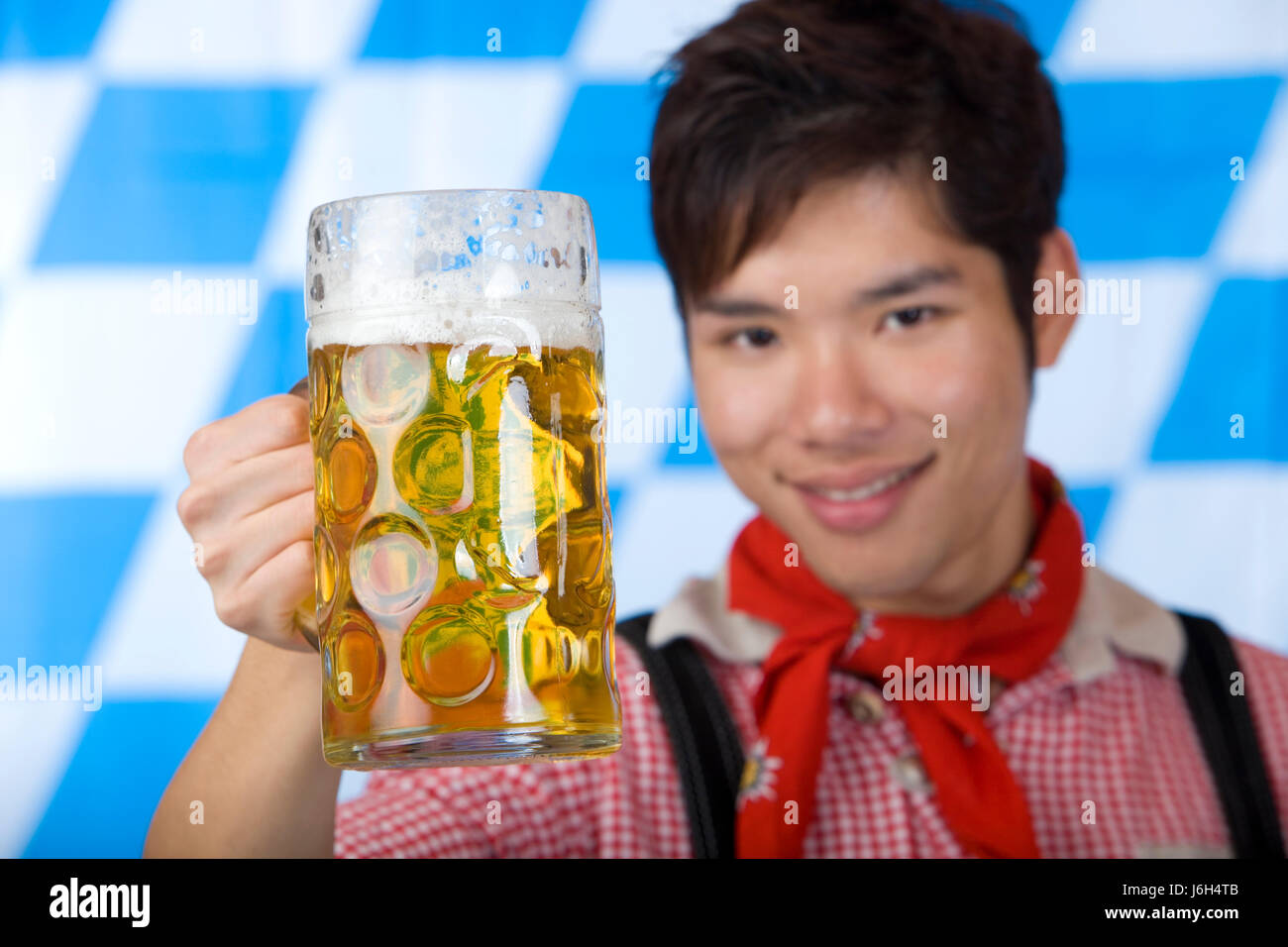 bavaria beer cheers bavarian young younger man guy humans human beings people Stock Photo