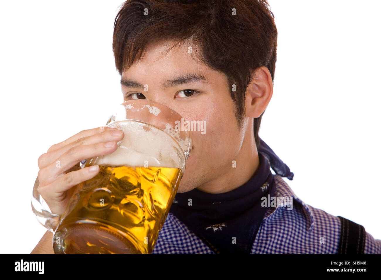 drink drinking bibs bavaria beer mass thirsty man guy glass chalice tumbler Stock Photo