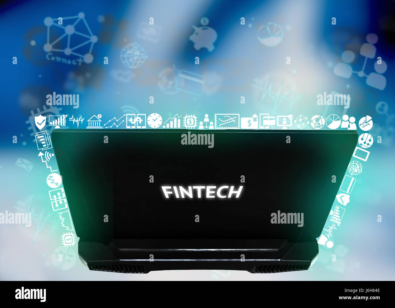 Fintech Investment Financial Internet Technology Concept. Notebook computer , icon with abstract blue background Stock Photo