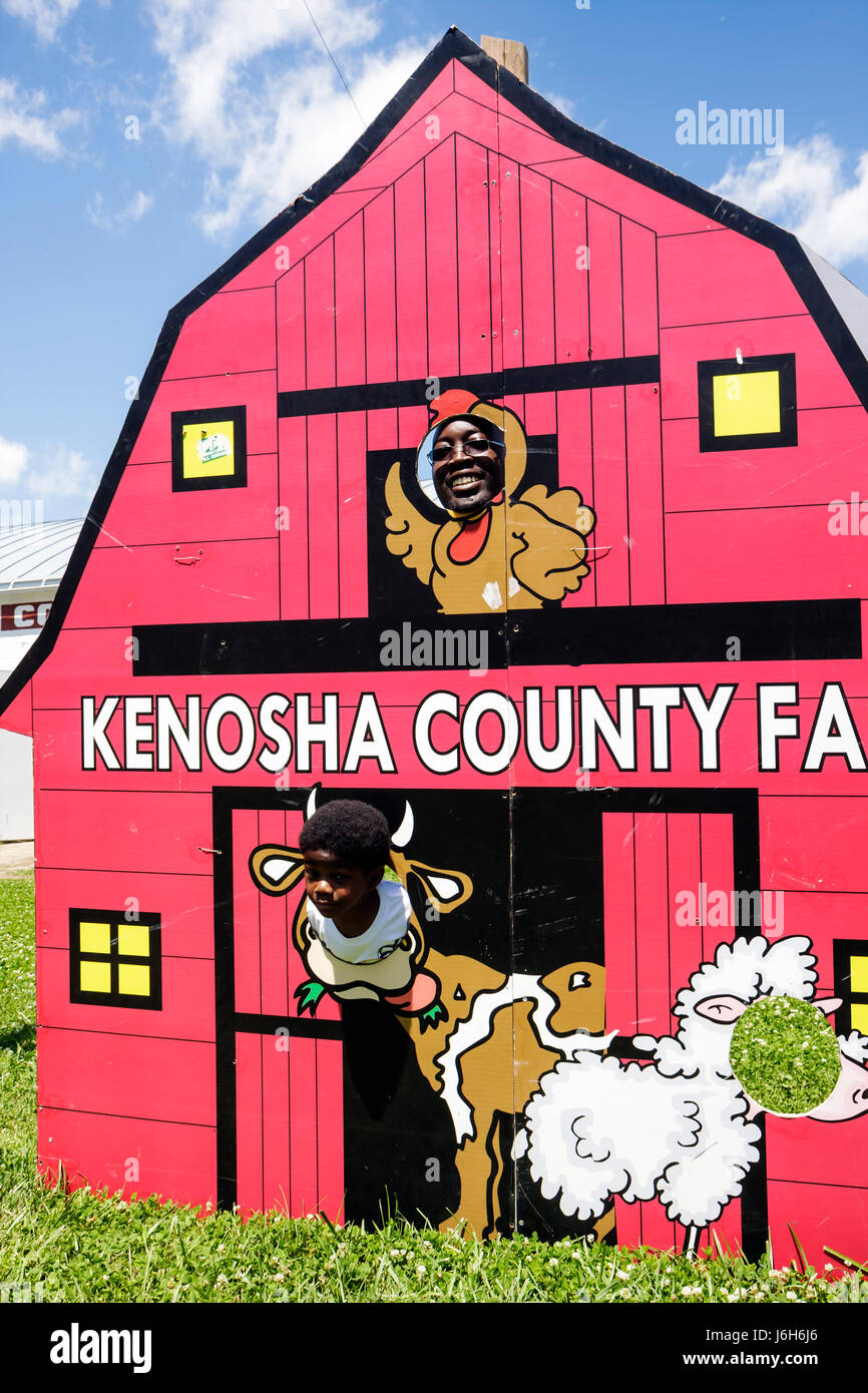 Kenosha Wisconsin,Kenosha County Fairgrounds,The Ultimate Kid Fest,family families parent parents child children,event,red barn facade,Black Blacks Af Stock Photo