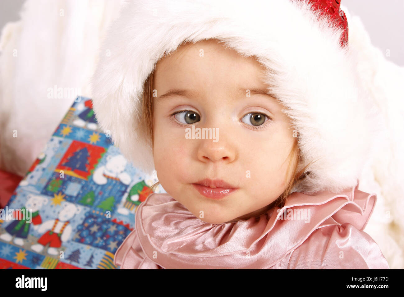 advent party celebration gift child toddler christmas xmas x-mas laugh laughs Stock Photo