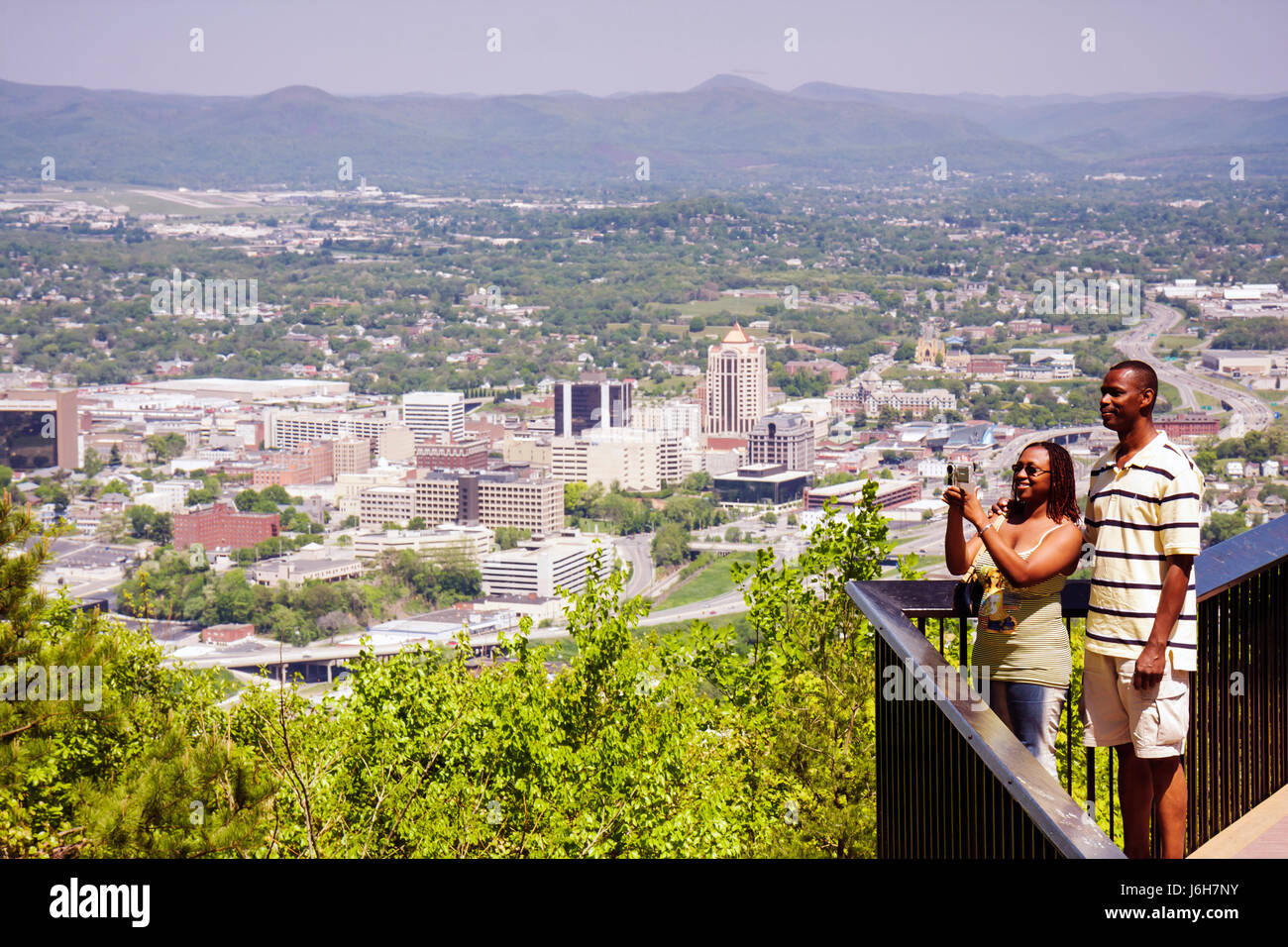 Roanoke Virginia,Mill Mountain Overlook,view,downtown,city,valley,Allegheny Mountains,Blue Ridge,Appalachian,man men male,woman female women,Jamaican, Stock Photo
