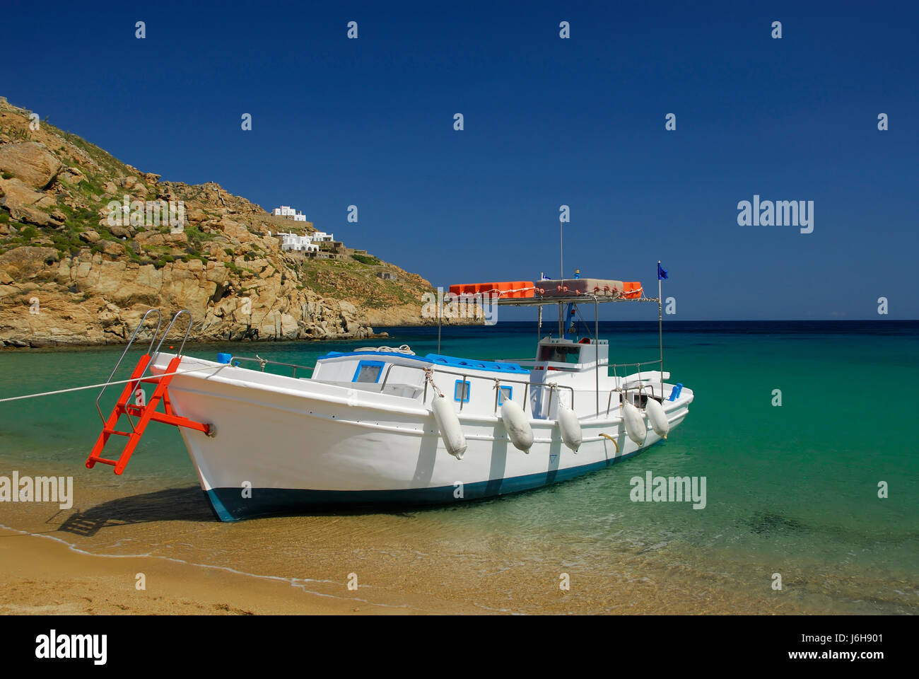 greece boat mykonos rowing boat sailing boat sailboat watercraft blue travel Stock Photo