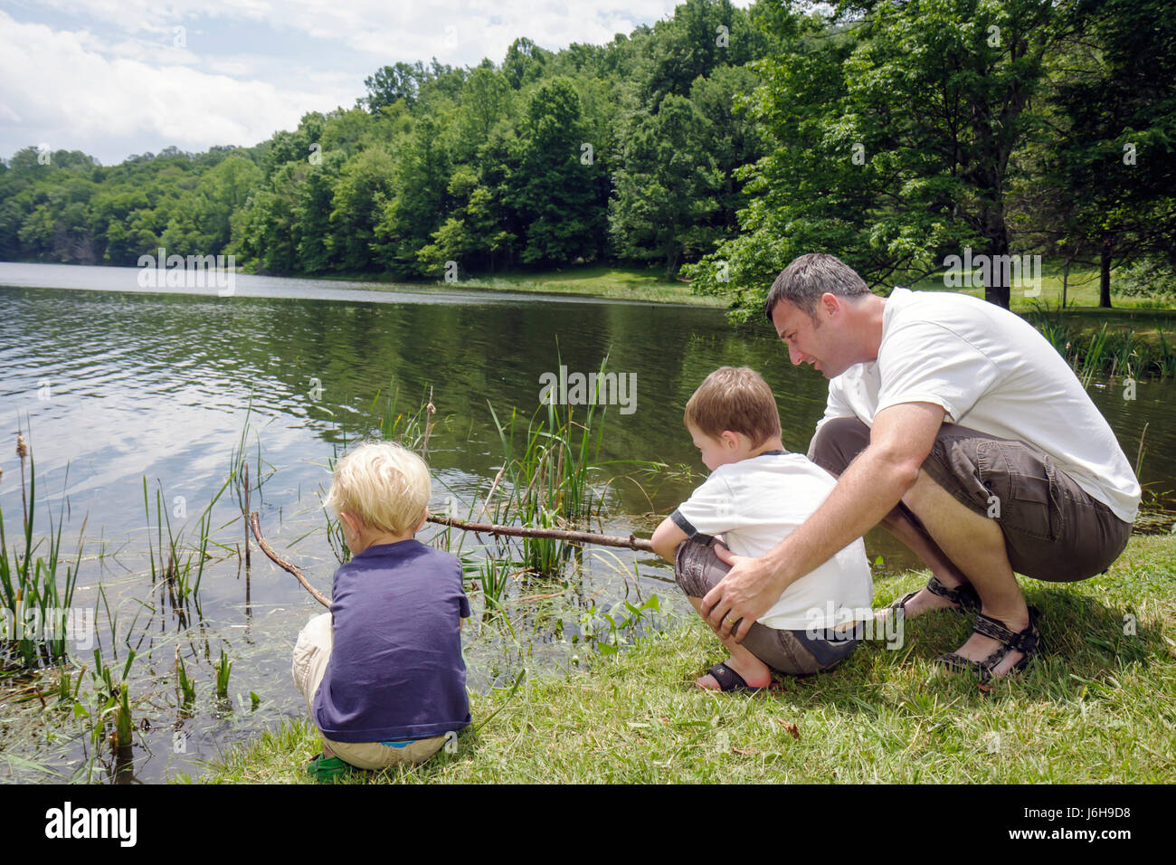 Father adult son fishing hi-res stock photography and images - Alamy