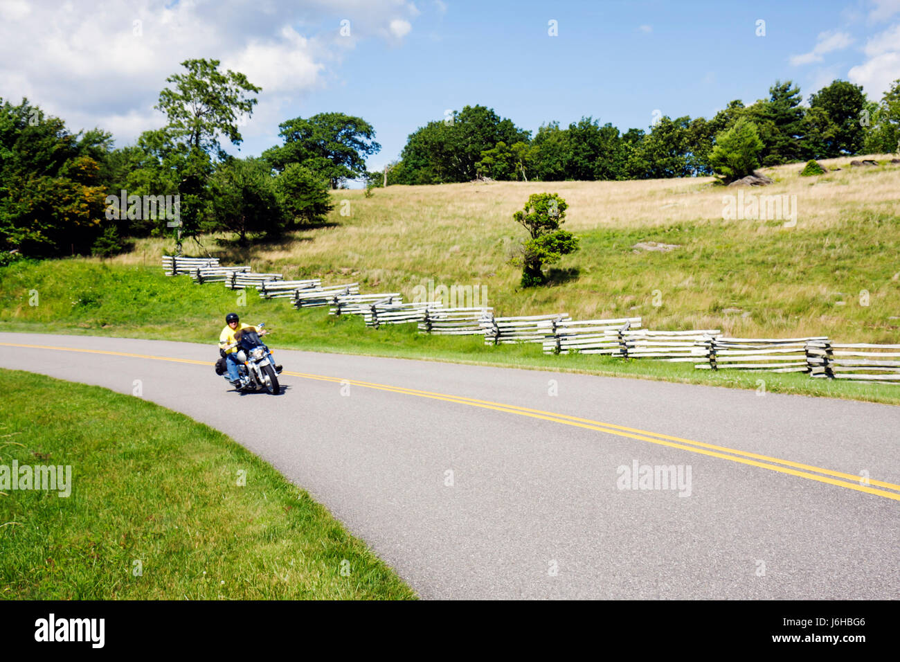Blue Ridge Parkway Virginia,Appalachian Mountains,Rocky Knob,milepost 170,rural fence,roadway,motorcycle motorcycles,biker bikers bicycle bicycles,bic Stock Photo