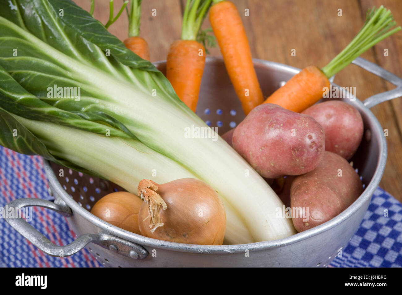 vegetable carrots onions sieve beet potatoes food aliment uncooked vegetarian Stock Photo