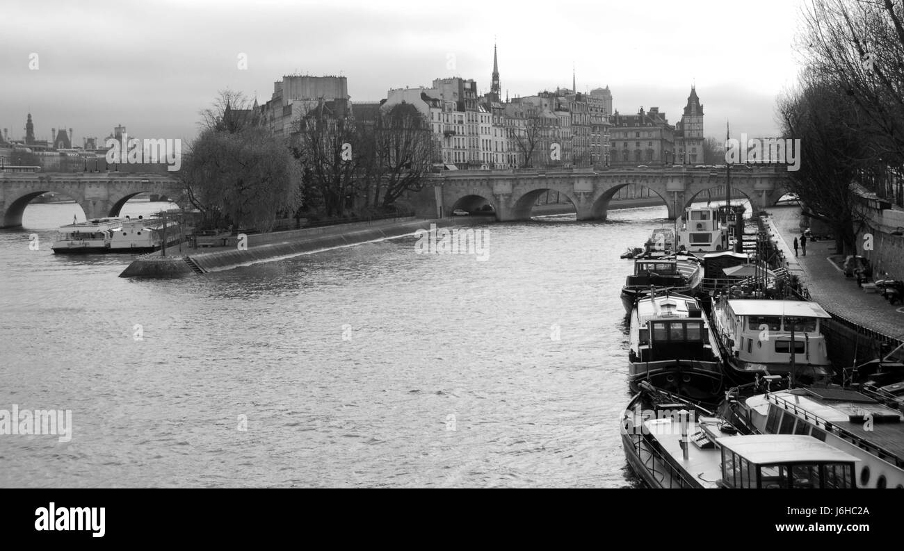 paris france seine river water travel city town famous cathedral bridge tourism Stock Photo