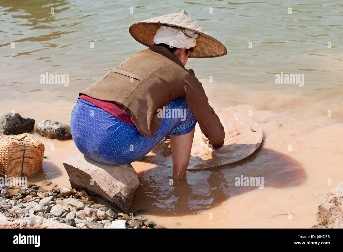 asia gold rush gold washer gold river water woman stone asia portrait ...