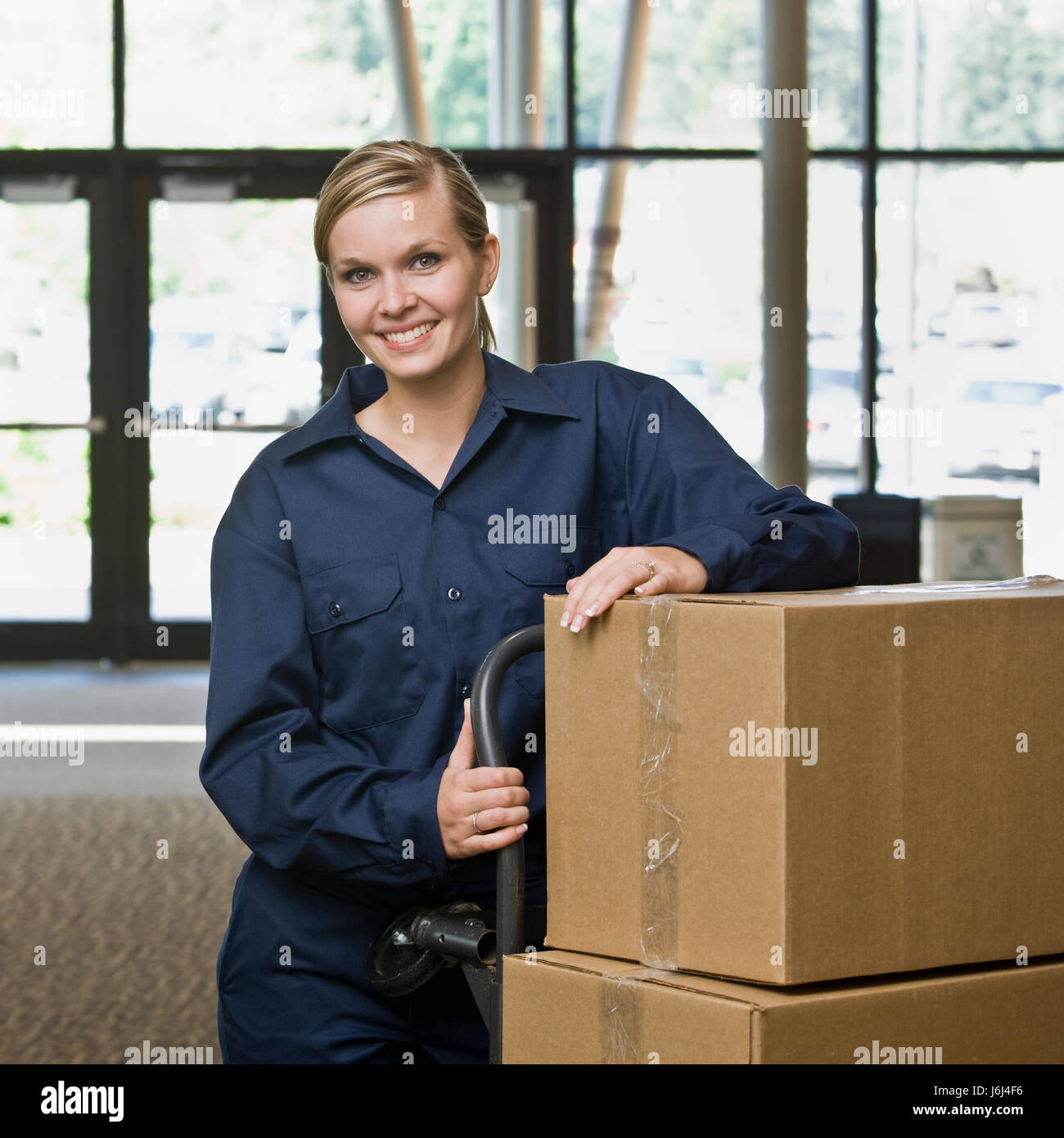 woman motion postponement moving movement office laugh laughs laughing twit Stock Photo