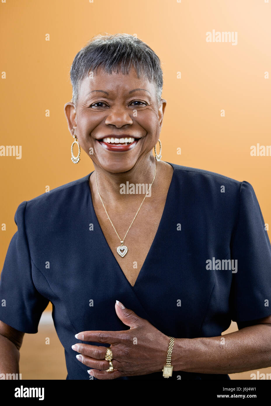 Older black woman poses portrait hi-res stock photography and images ...