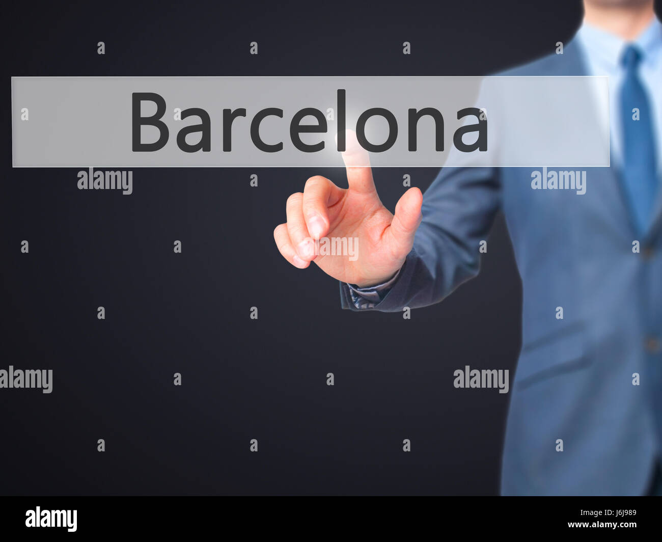 Barcelona - Businessman hand pressing button on touch screen interface. Business, technology, internet concept. Stock Photo Stock Photo