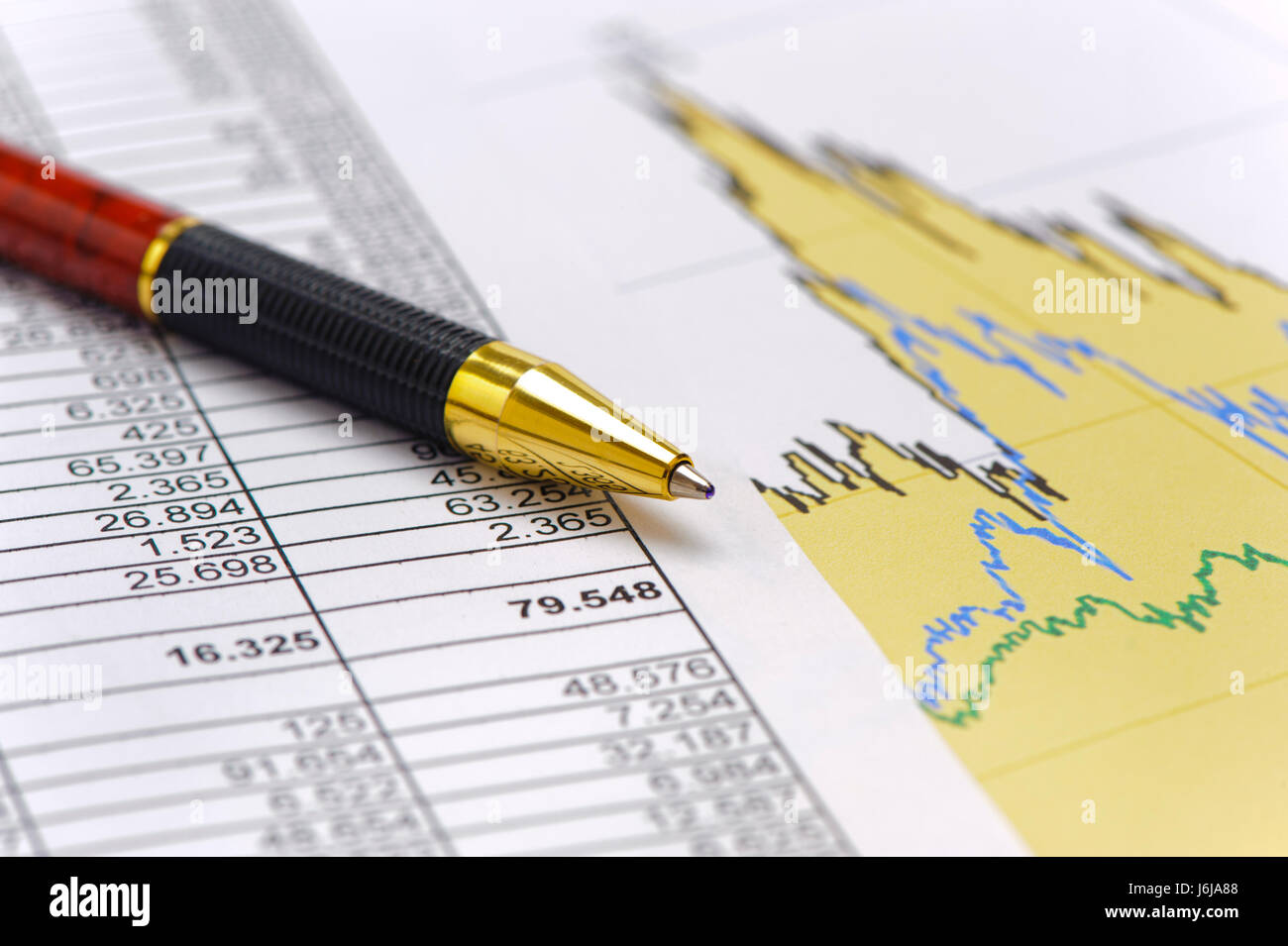 financial chart and table sheet show success at exchange market Stock Photo