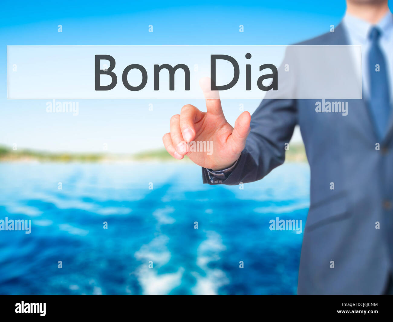 Bom Dia (In portuguese - Good Morning) - Businessman hand touch button ...