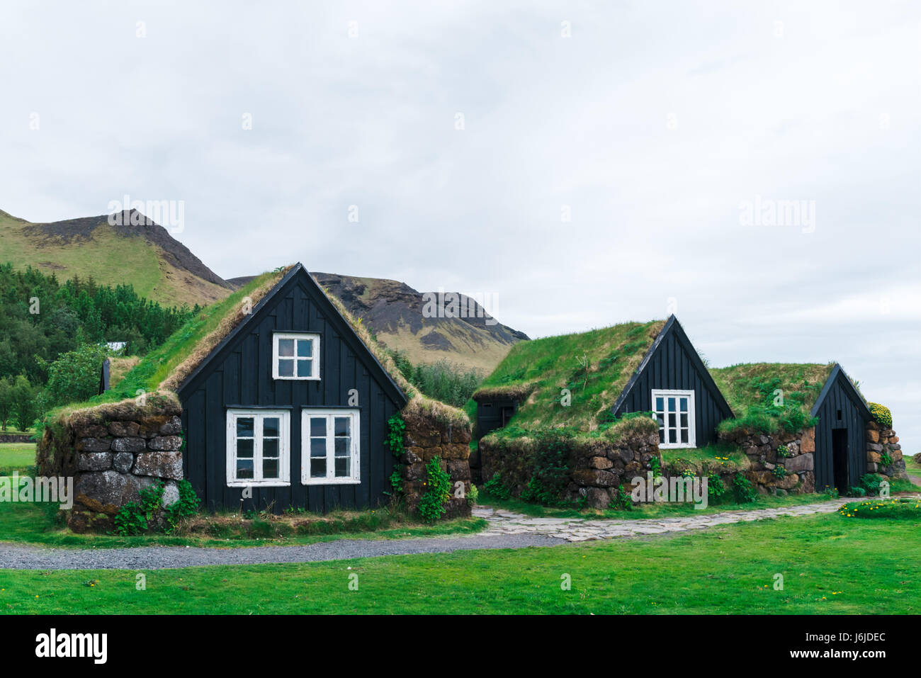 Traditional houses with grass on roof in Iceland Stock Photo