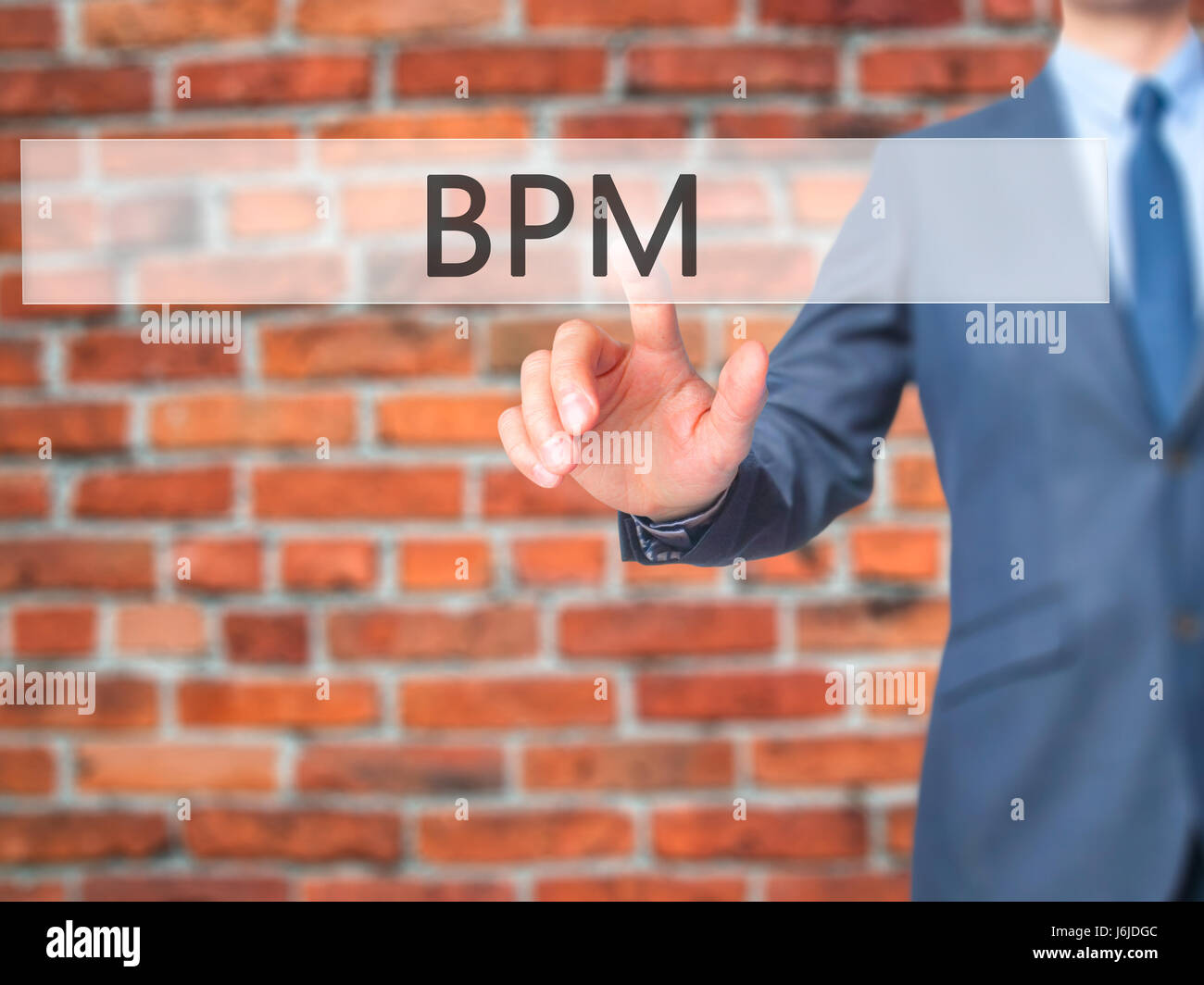 BPM (Business Process Management) - Businessman hand touch button on ...
