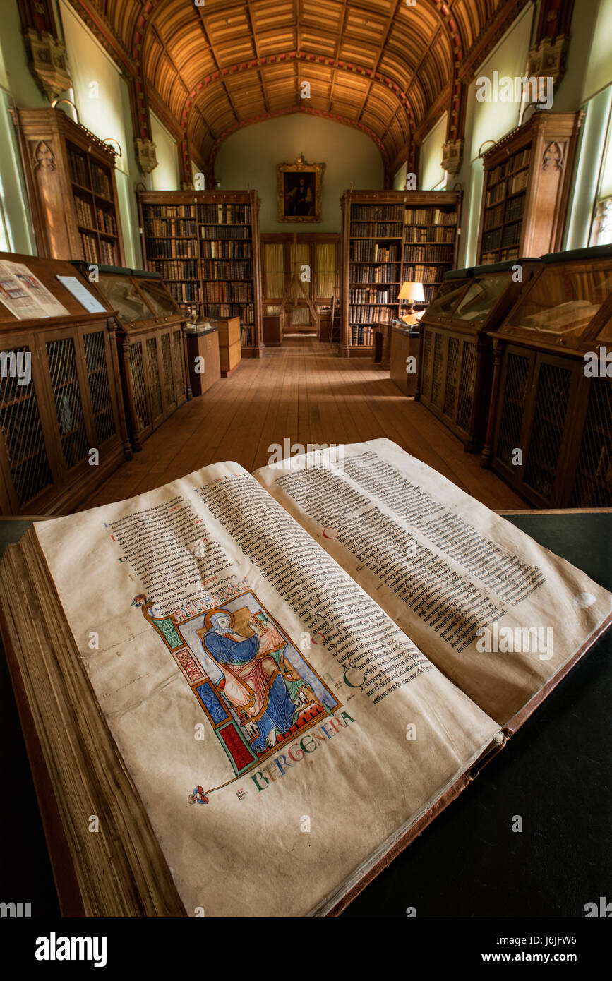 Parker Library Manuscripts, Corpus Christi College Cambridge, England, UK. 10 June 2016 Photo shows: Saint Matthew opening a book, initial from the illuminated manuscript Dover Bible, Canterbury,c 1150. Showing the Parker Librarian Dr. Christopher de Hamel in some of the photographs. Stock Photo