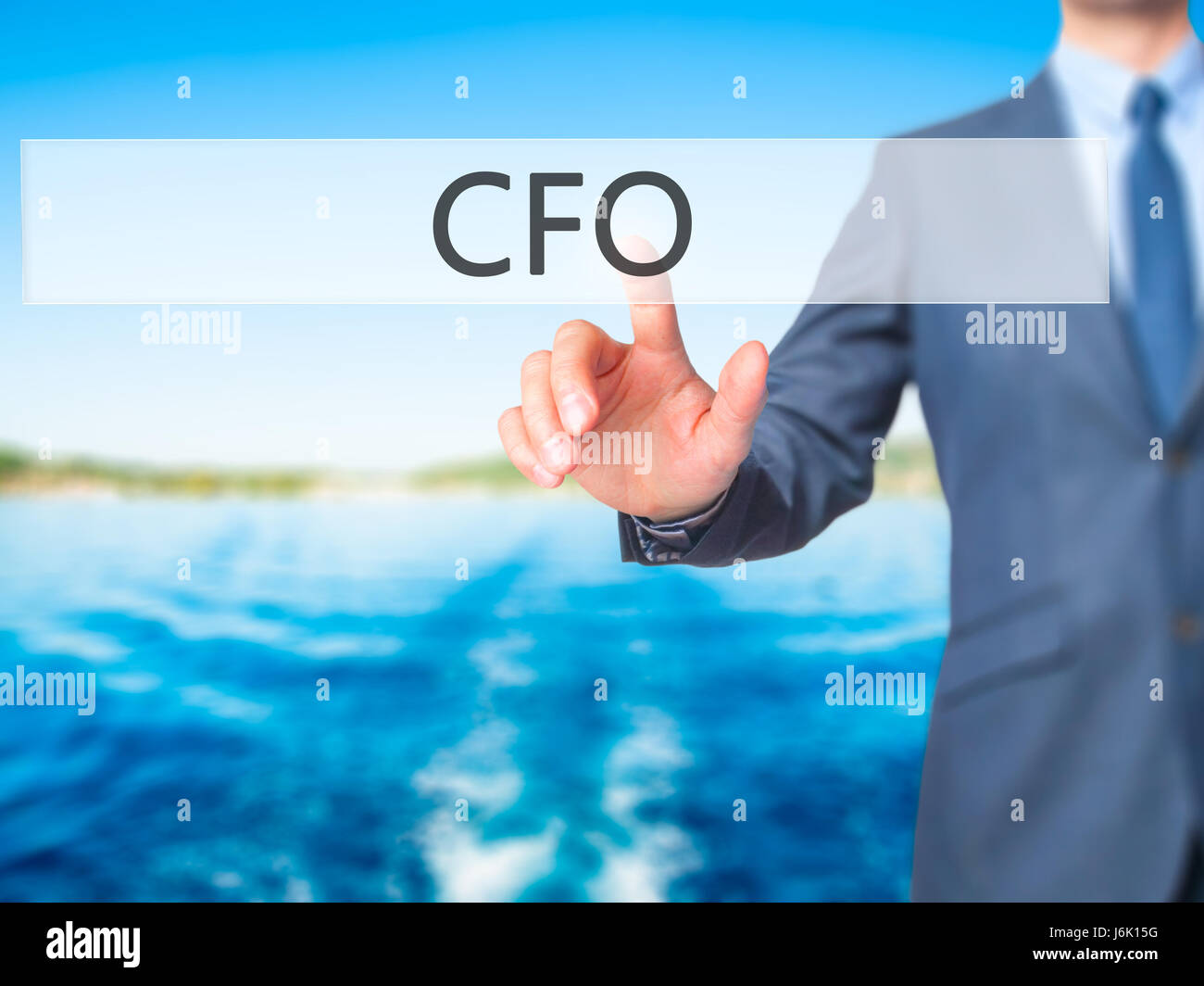 CFO (Chief Financial Officer) - Businessman press on digital screen ...