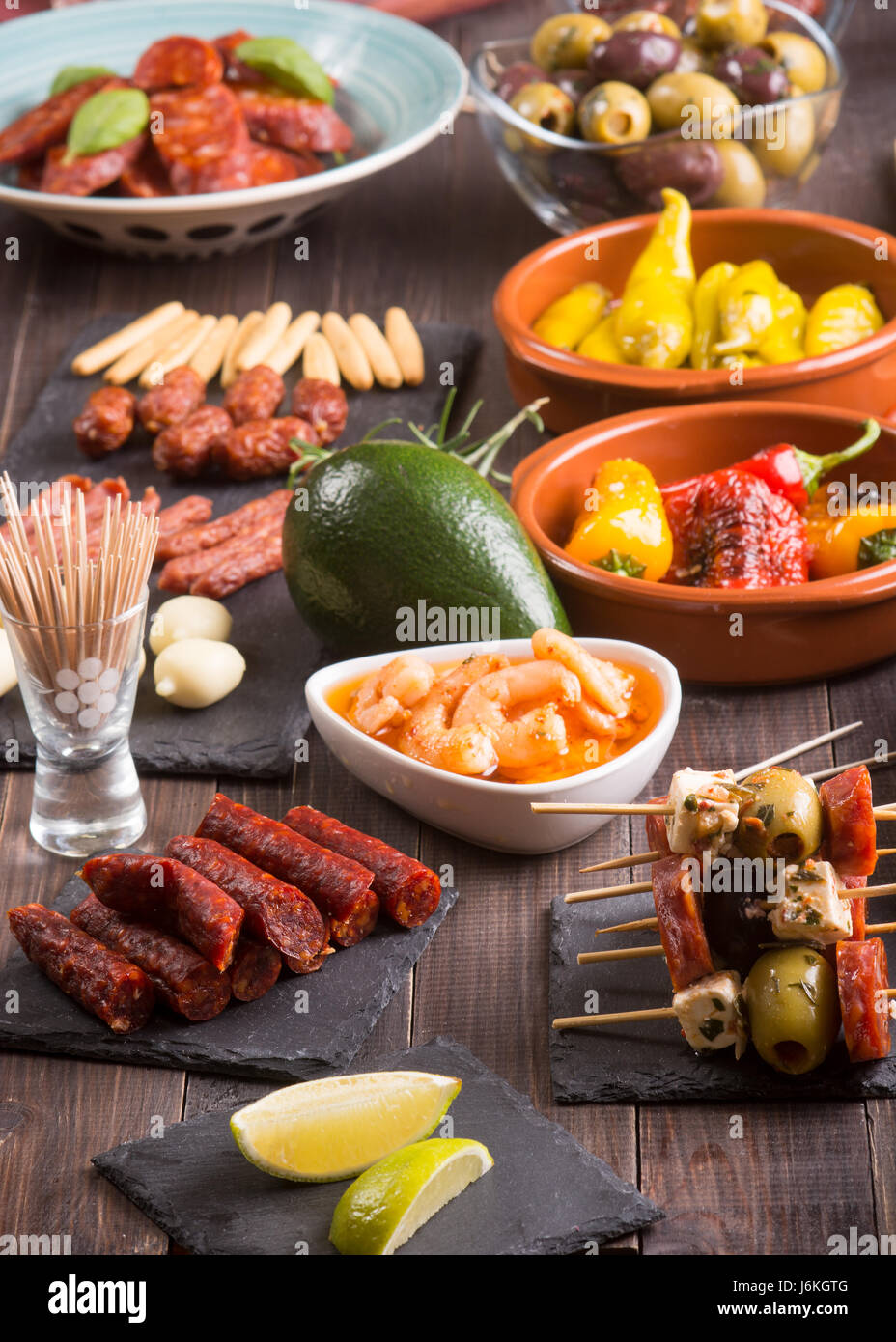 Mediterranean cuisine. Spanish tapas starters on wooden table ...